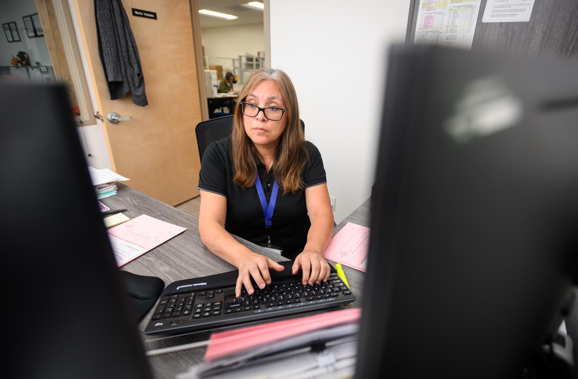 Lake County Registrar Maria Valadez at work in her office in Lakeport.