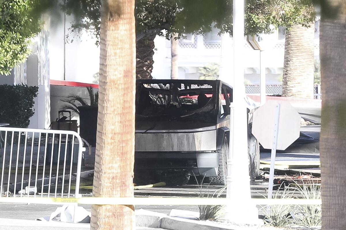 A Tesla Cybertruck is shown after it caught fire and exploded outside the lobby of President-elect Donald Trump's hotel.