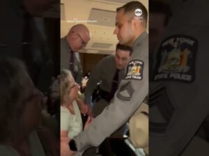 WATCH: Woman Forcibly Removed From Mike Lawler Town Hall 9