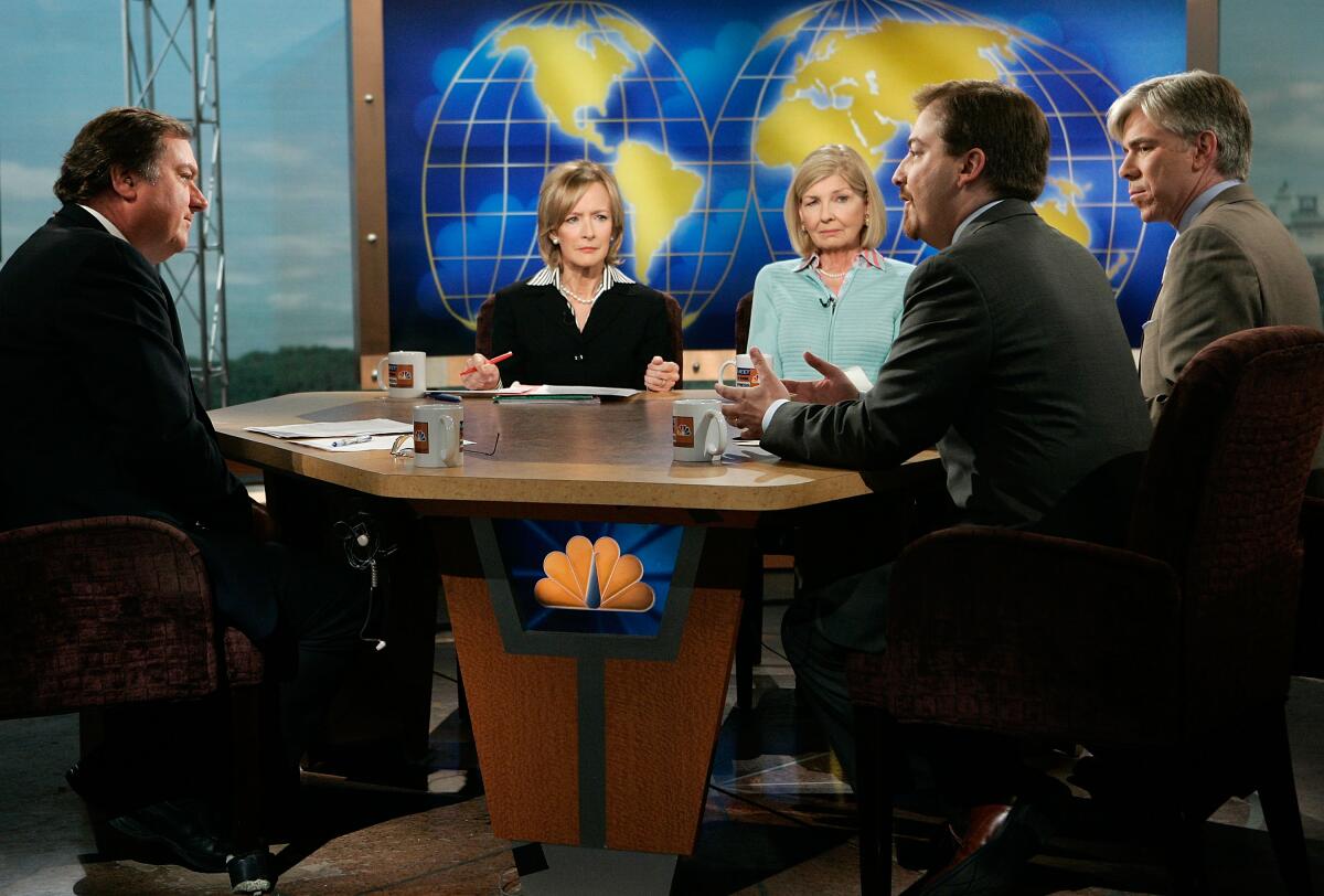 guests joined a roundtable discussion during a taping of the PBS' "The News Hour"